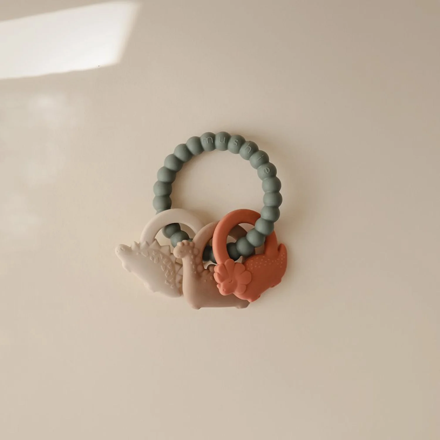 Mushie Dried Thyme Mushie Dino Teething Ring - Image 4